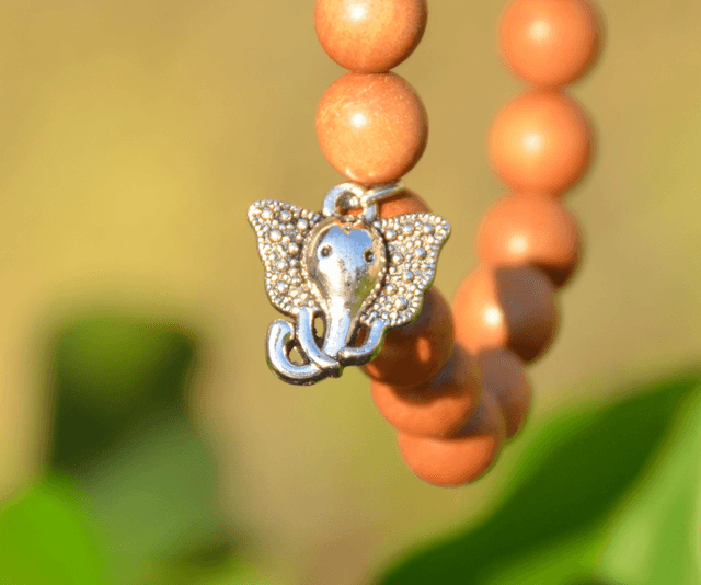 Mala bracelet élastique Sandelwood avec Ganesh