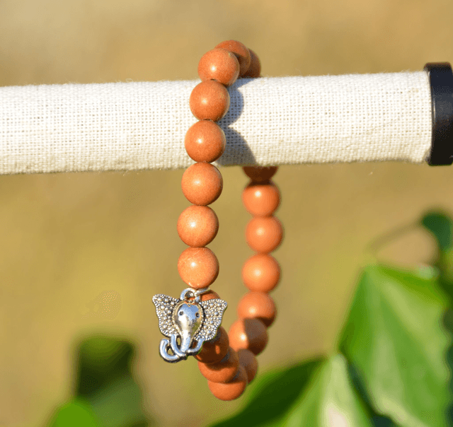 Mala bracelet élastique Sandelwood avec Ganesh