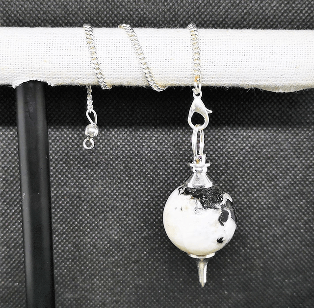 Pendule Pierre de Lune sphérique métal