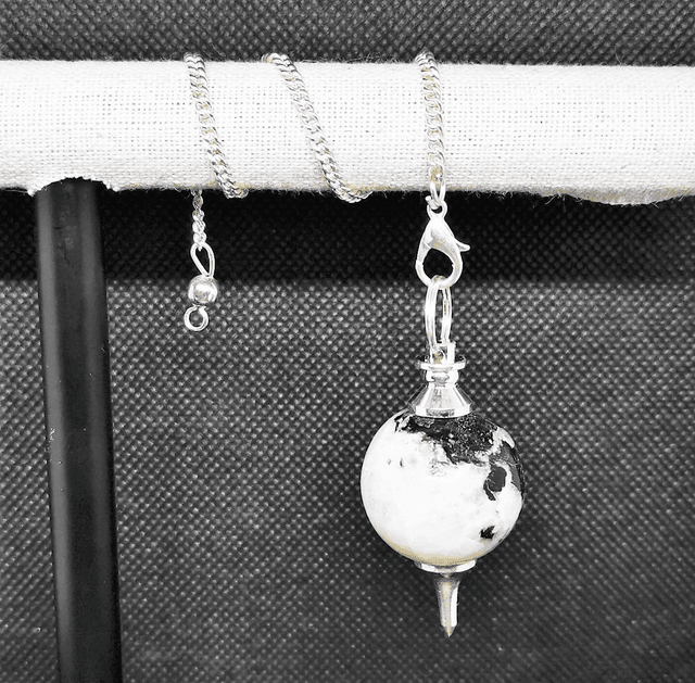 Pendule Pierre de Lune sphérique métal